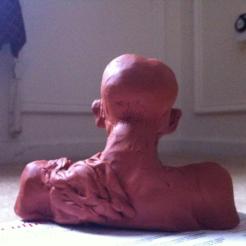 Gandhi: rear view | Plado sculpture, 5"x4"x3"; sculpted and oven baked. Cleveland, OH, 30 Dec 2012